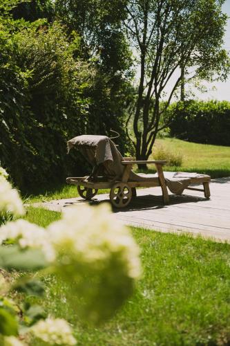 a baby carriage sitting next to a picnic table at Casa Kiko Pecetto in Pecetto