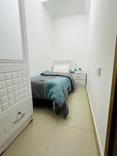 En eller flere senge i et værelse på Abu Dhabi Pearl
