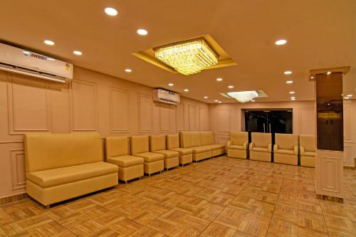 a conference room with chairs and a skylight at Townhouse Refresh in Kolkata