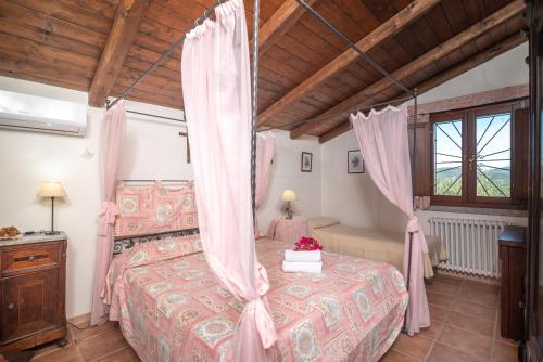 Ένα ή περισσότερα κρεβάτια σε δωμάτιο στο Villa Peditoltu