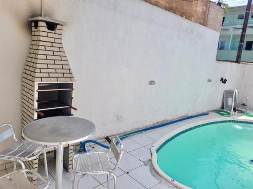 Swimmingpoolen hos eller tæt på Casa de 2 QUARTOS COM PISCINA