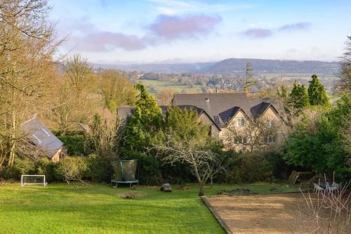 a view of a yard with a house at 19th Century House Private Parking nr Painswick in Painswick