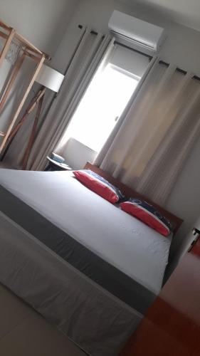 Postel nebo postele na pokoji v ubytování Casa de férias Sol Dourado