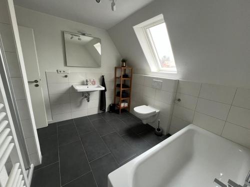 Ένα μπάνιο στο Ferienwohnung Seeromantik