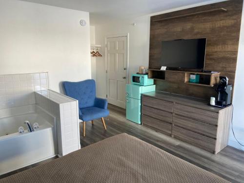 Kuchyň nebo kuchyňský kout v ubytování Flagship Inn