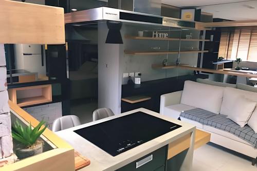 Η κουζίνα ή μικρή κουζίνα στο Golden Ingá Hotel Flat