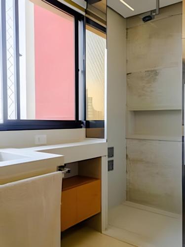 Ένα μπάνιο στο Golden Ingá Hotel Flat