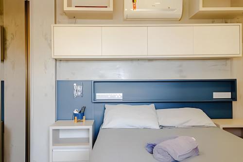 Ένα ή περισσότερα κρεβάτια σε δωμάτιο στο Golden Ingá Hotel Flat