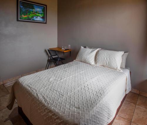 Cama o camas de una habitación en Hotel Almore