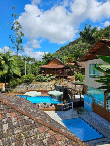a view of the pool at a resort at Delícias da Tilápia em Domingos Martins ES in Domingos Martins