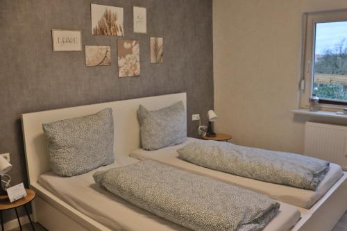 Katil atau katil-katil dalam bilik di Ferienwohnung am Koppenstein