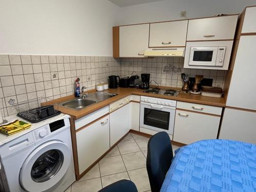 Kuchyň nebo kuchyňský kout v ubytování Apartment DS - Rebberg
