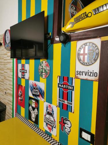 a door with stickers on it with a table at Gigiotto garage in Siracusa