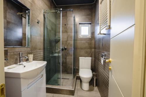 Ein Badezimmer in der Unterkunft Almarini Guesthouse