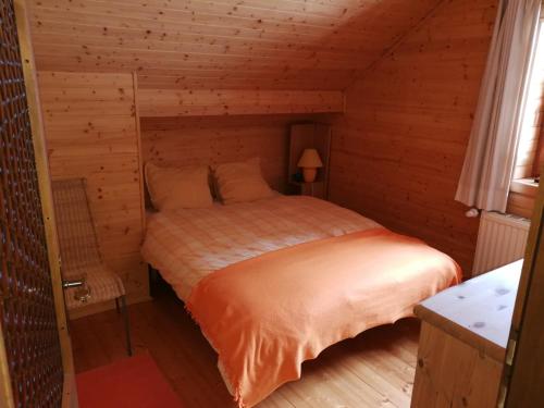 Postel nebo postele na pokoji v ubytování Chalet Dreibubenhaus.