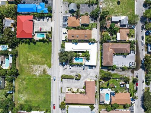 an overhead view of a parking lot with houses at Cozy Studio in Lake Worth with Pool in Lantana