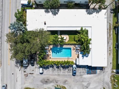 an aerial view of a villa with a swimming pool at Lake Worth Getaway- Cozy Studio - Pool in Lantana