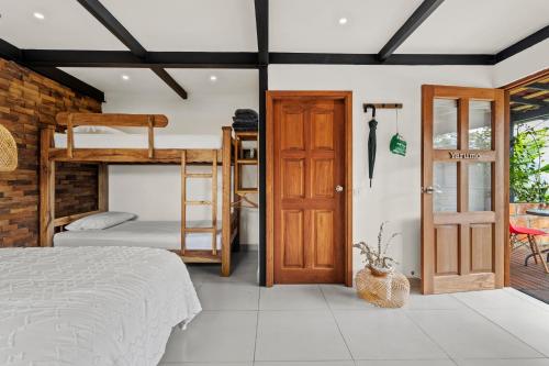 Una cama o camas en una habitación de Gulupa Ecolodge