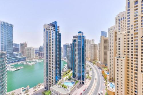 an aerial view of a city with tall buildings at Ahlan New Horizon JBR in Dubai