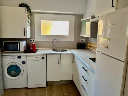 Kuchyň nebo kuchyňský kout v ubytování Apartamento playa