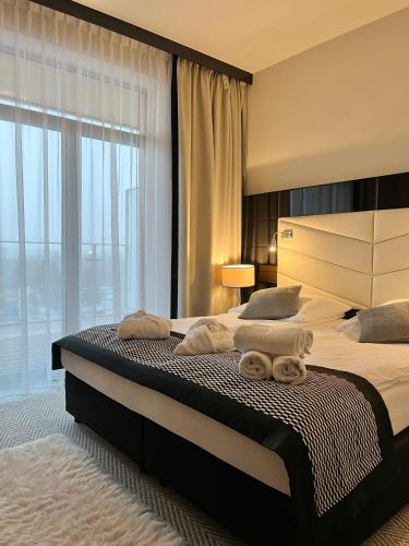 Ένα ή περισσότερα κρεβάτια σε δωμάτιο στο Aparthotel Diune A69
