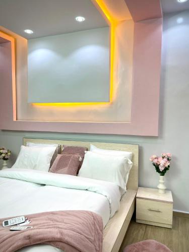 Ένα ή περισσότερα κρεβάτια σε δωμάτιο στο Residhome Appart Hotel Saint Louis 201
