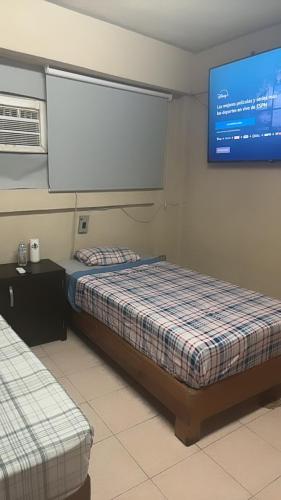 Postel nebo postele na pokoji v ubytování Itzaes