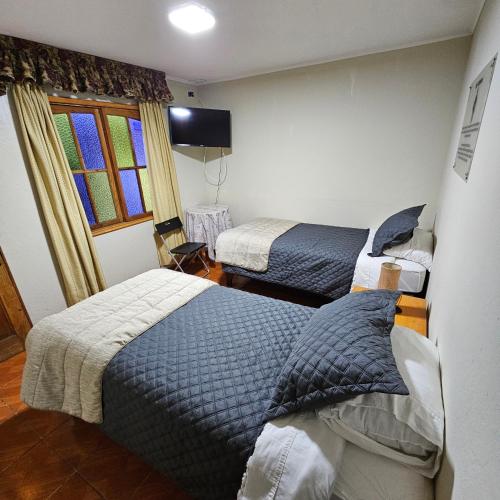 Hotel Cristobal Colonにあるベッド