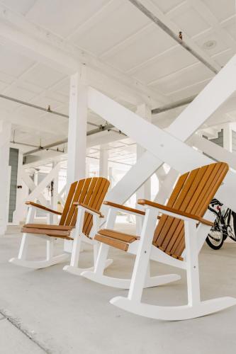 a row of chairs in a parking lot at 3005 Queen Suite, 3rd Floor Surfside in Surf City