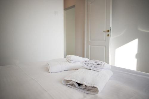 En eller flere senge i et værelse på CozyApartment near MetroGorjului