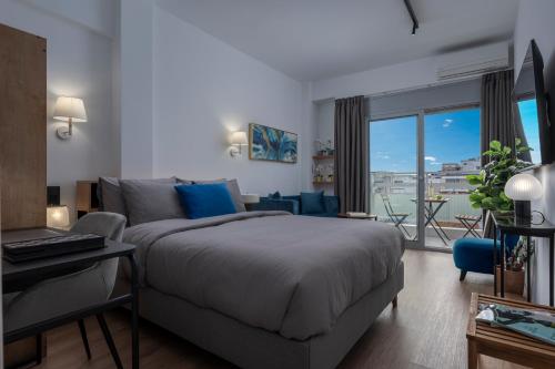 Una cama o camas en una habitación de Plaza Elegant Suites