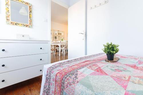 Letto o letti in una camera di Acogedor apartamento junto a la playa