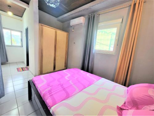 Llit o llits en una habitació de Yafé Bastos 19