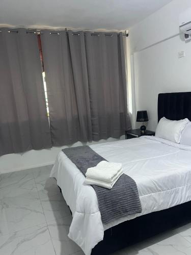 Llit o llits en una habitació de Departamento Sol