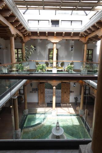 an overhead view of a pool in a building at Indian Palace Hotel Boutique Spa & Restaurante in Antigua Guatemala