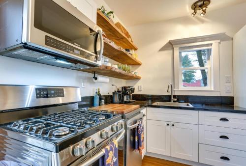 a kitchen with a stove and a sink at Victorian Lake Oasis Hot Tub Private Lakefront in Lake Huntington