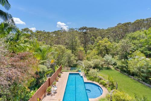 an overhead view of a swimming pool in a garden at Poolside oasis - Sydney in Sydney