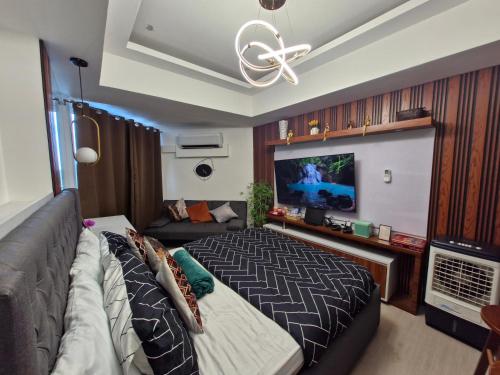 TV a/nebo společenská místnost v ubytování Northern Suites Azure North