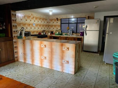 O bucătărie sau chicinetă la Cuarto individual centro histórico 300bm