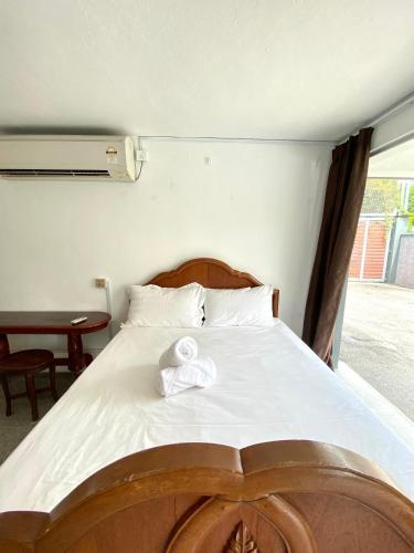 Postel nebo postele na pokoji v ubytování Seahome Boutique Hotel