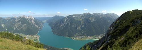 a view of a river in a mountain range at Chalet & Apartments Tiroler Bua in Achenkirch