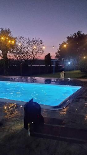 Kolam renang di atau dekat dengan Sítio em Torres com Piscina e vista para Lagoa da Itapeva - Sítio Éden