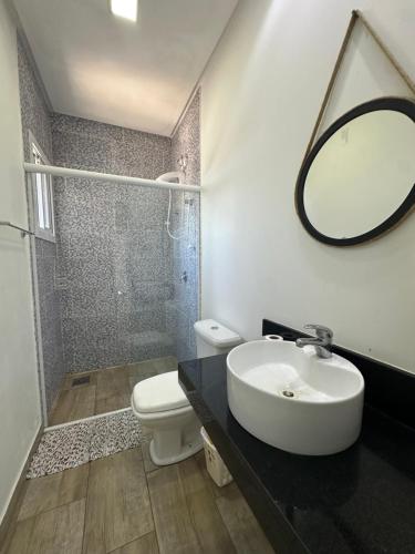 Bilik mandi di Casa com Piscina em Xangri-Lá RS