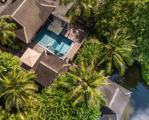 Bazén v ubytování Anantara Mai Khao Phuket Villas nebo v jeho okolí