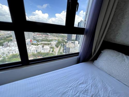 Кровать или кровати в номере I-City Luxury Condominiums, Shah Alam - Smarthome
