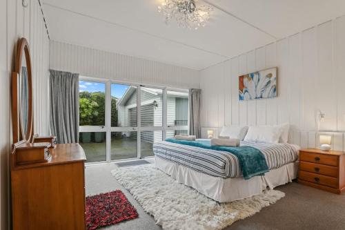 Ένα ή περισσότερα κρεβάτια σε δωμάτιο στο Groovy on Grey