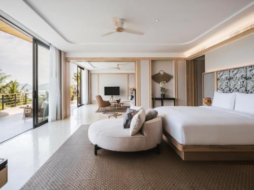 Postel nebo postele na pokoji v ubytování Anantara Koh Yao Yai Resort & Villas