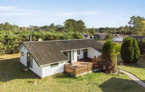 an aerial view of a house with a deck at 3 Bedroom Stunning Home In Rødby in Rødby