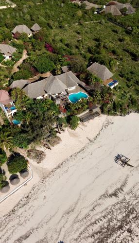 an aerial view of a resort on a beach at Zi Villa Main House in Matemwe