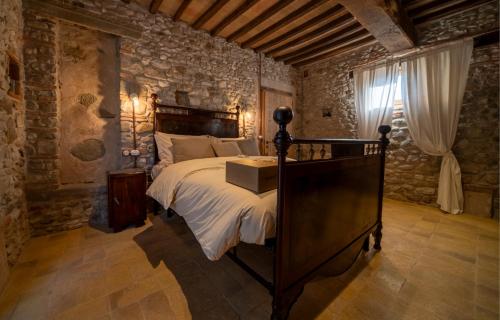 Postel nebo postele na pokoji v ubytování Agriturismo Podere Tovari